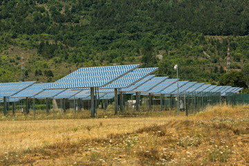 Solar battery panel on the green meadow.