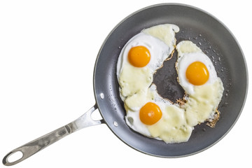Three Sunny Side Up Fried Eggs, With Edam Cheese Slices, in Teflon Frying Pan, Isolated on White Background.