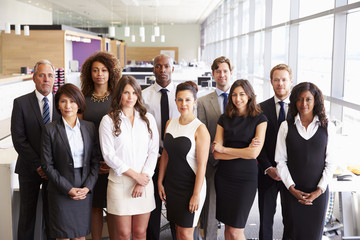 Obraz premium Group portrait of a team of serious office coworkers