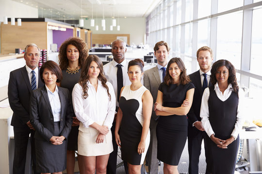 Group portrait of a team of serious office coworkers