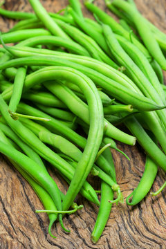 green beans on wooden