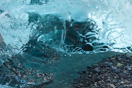 Beautiful texture of ice. Melting glaciers climate change concept. Drifting icebergs in Atlantic ocean. Jokulsarlon lagoon, South Iceland, Vatnajokull glacier.