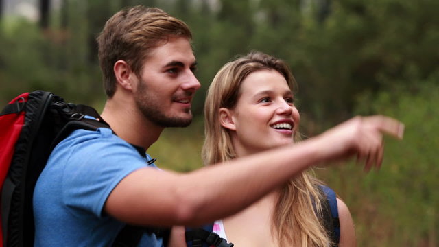Happy young couple kiging together