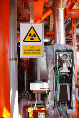 Flow meter, with high radiation sign. - obrazy, fototapety, plakaty