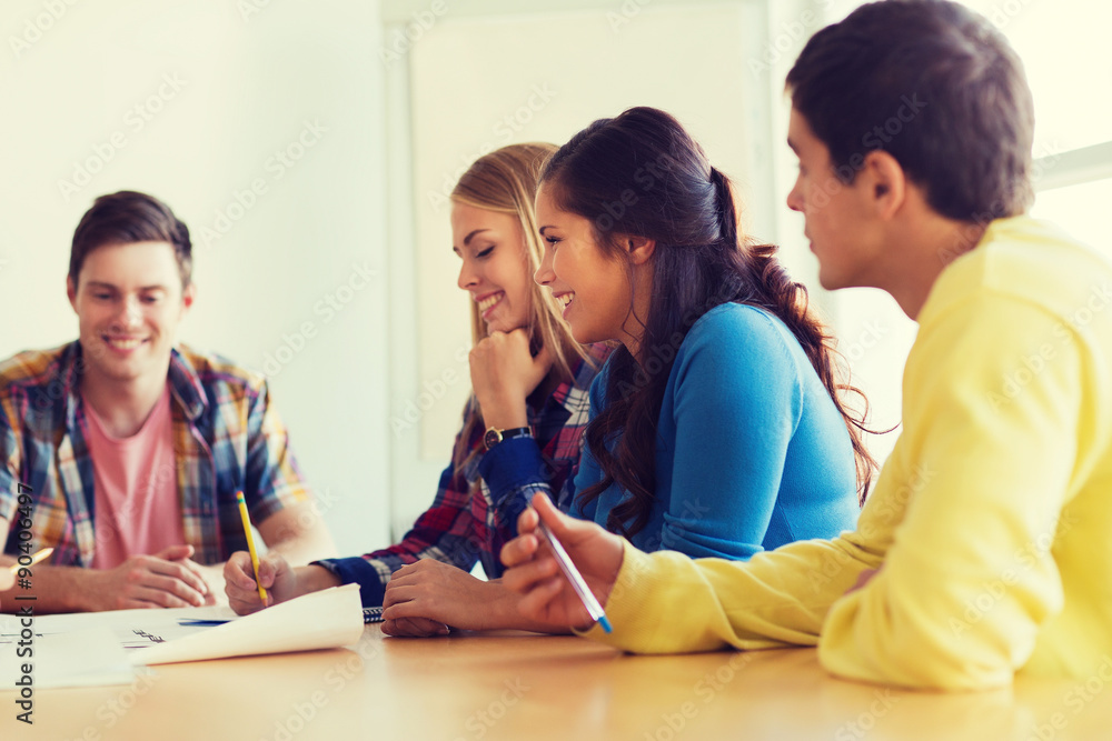 Canvas Prints group of smiling students with blueprint