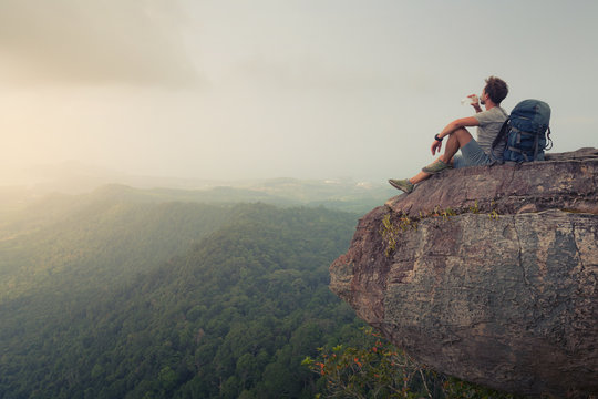 Hiker relaxing on the rock