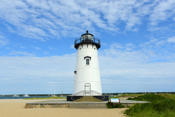 Fototapeta na wymiar Edgartown Harbor Lighthouse at the entrance into Edgartown Harbor and Katama Bay, Martha's Vineyard, Massachusetts, USA. This historic lighthouse was built in 1828.