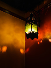 Moroccan stsyle lamp casting pattern on wall.Exotic, © Mushy