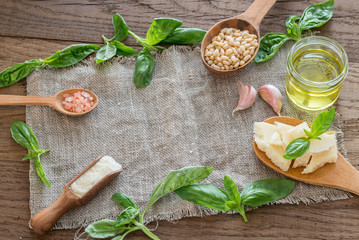 Ingredients for pesto on the wooden table