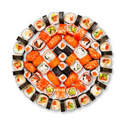 Set of sushi, maki, gunkan and rolls isolated at white