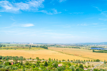 Fototapeta na wymiar View from hill to valley, Bratislava, Slovakia, car factory on horizon