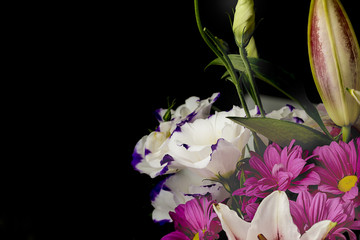 Flowers bouquet on a black background