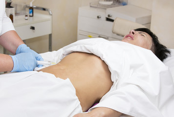 Obraz premium woman is in the process cellulite mesotherapy clinic
