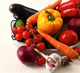 Pile of organic vegetables on a rustic wooden table