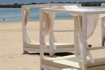 spain, fuerteventura. King size bed with canopy on the beach © doryx