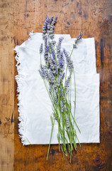 bouquet of lavender on the tablecloth on wooden table