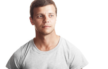Fototapeta premium Portrait of the young happy man isolated on a white background