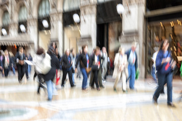 Urban move, people walking in city, motion blur, zoom effect