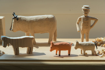 Hand-made wooden toys: man and animals