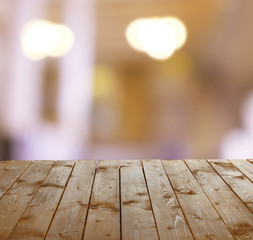 Wooden table  with abstract  blur background