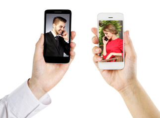 Couple on screens of phones. Online video call concept