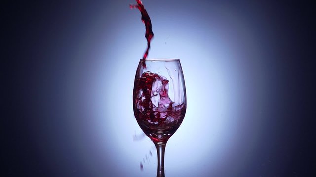 7 Glass Filled With Red Wine In Super Slowmotion