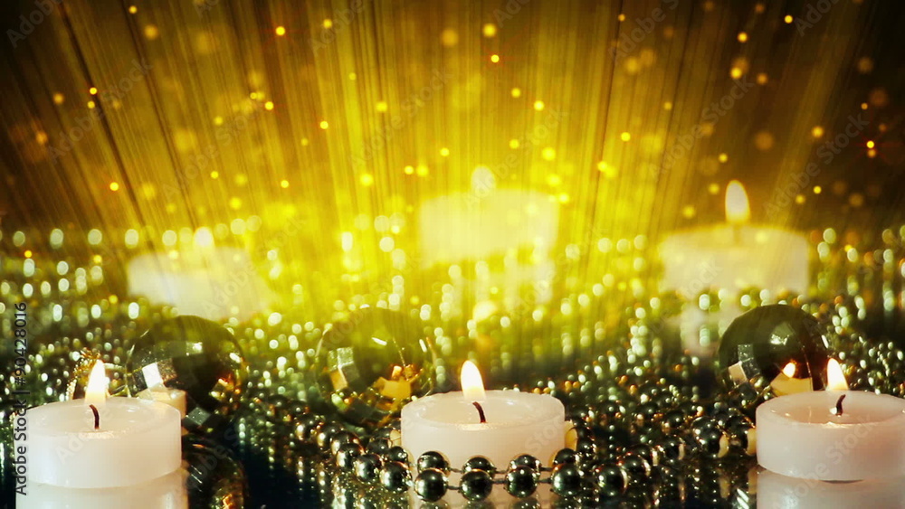 Poster burning candles and glitter particles in light beams loop