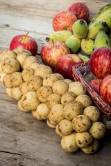 Assorted fresh fruit natural background wood floors.