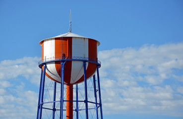 Red and white water tower