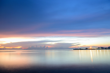 Panoramic dramatic sunset sky and tropical sea at dusk.Long expo