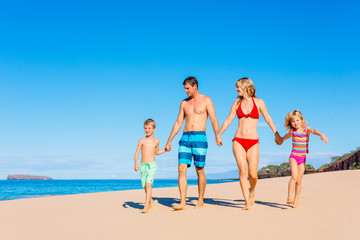 Happy Family Having Fun on the Beach