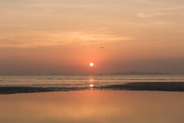 Tropical orange beach sunset sky background