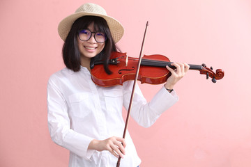 Asian teen with violin glasses hat smile