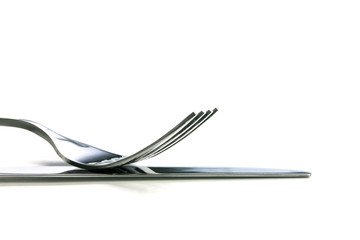 selective focus of close up dinning silverware fork and knife wi