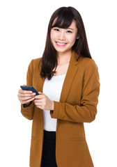 Businesswoman use of the cellphone