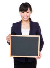 Asian young businesswoman show with empty chalkboard