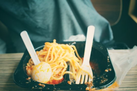 Woman Eating Spaghetti With Sauce