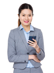 Businesswoman use of the cellphone
