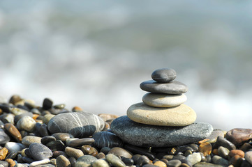 a pyramid of sea stones