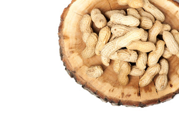 Pile of unshelled peanuts, isolated on white background
