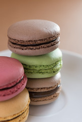 French sweet delicacy macaroons on wood background