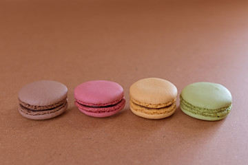 French sweet delicacy macaroons on wood background
