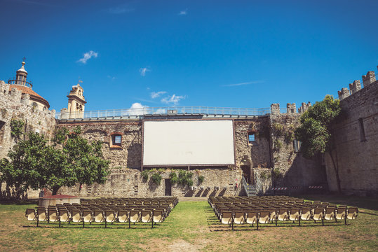 Outdoor cinema in a castle in Italy