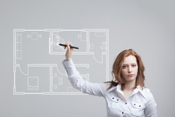 female architect working with a virtual apartment plan