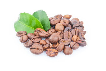 Coffee beans and green leaves