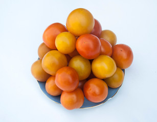 Different sorts of tomatoes served on a white dish
