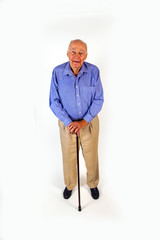 Fototapeta premium happy elderly man standing with his walking stick
