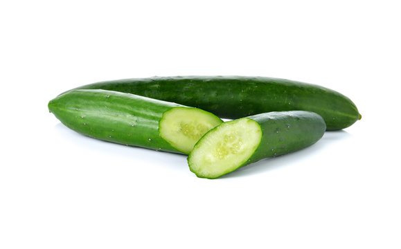 whole and  cut Japanese Cucumber on white background