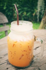 Ice oolong tea and milk on a jar