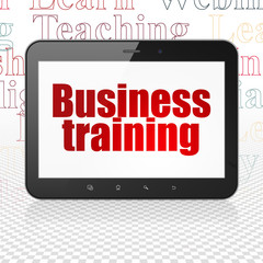 Learning concept: Tablet Computer with Business Training